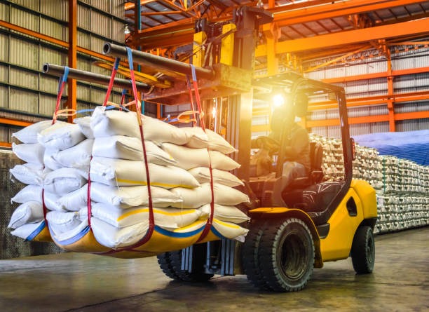 forklift handling sugar bags for